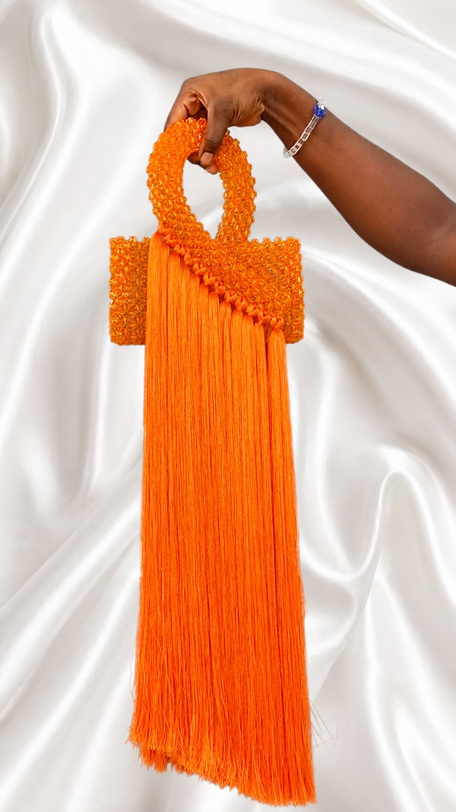 Woven Tassel Clutch